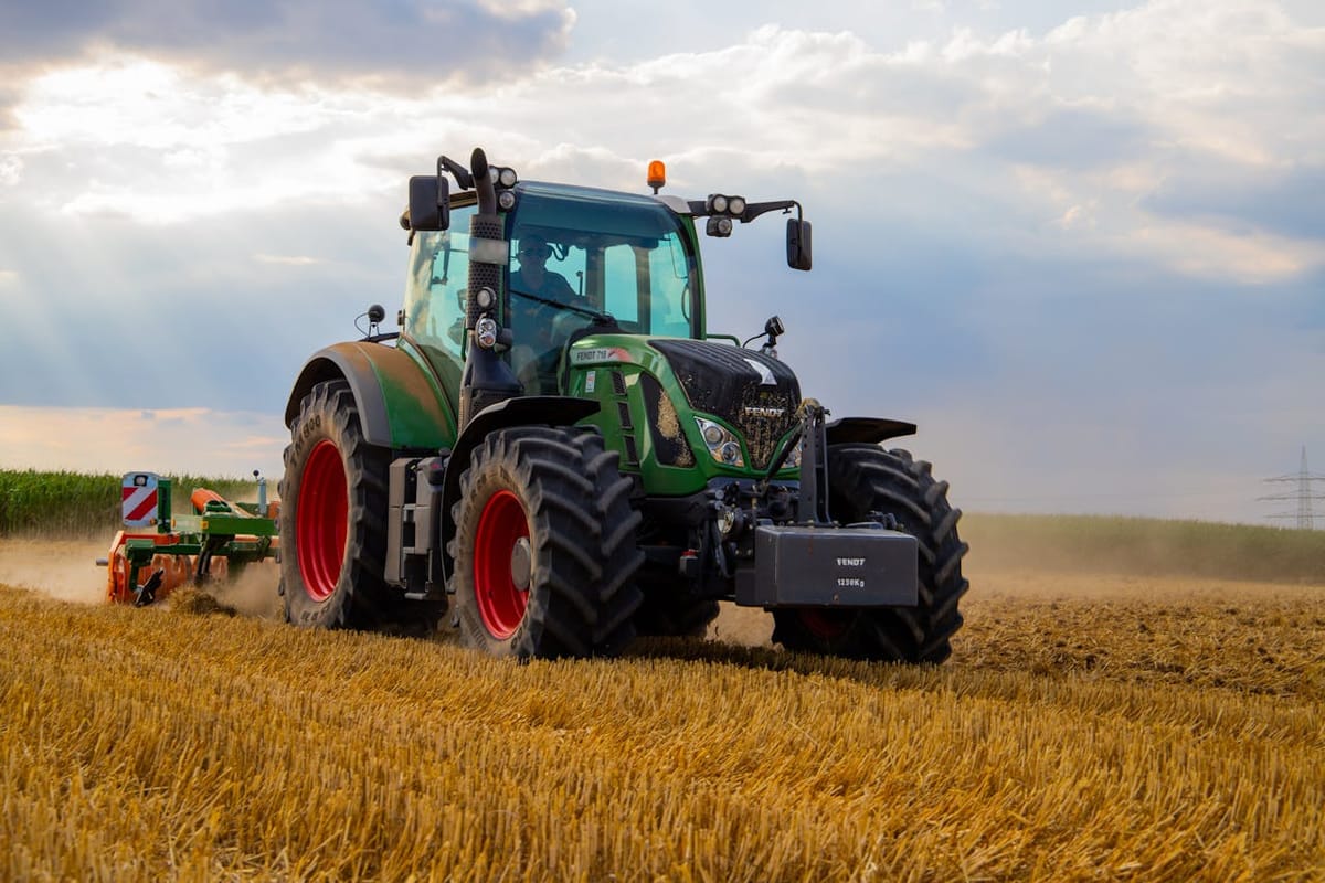 Green Tractor at Work